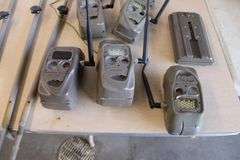 10 Cuddeback game cameras w/poles & accessories