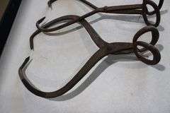 2 antique ice tongs
