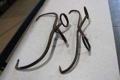 2 antique ice tongs