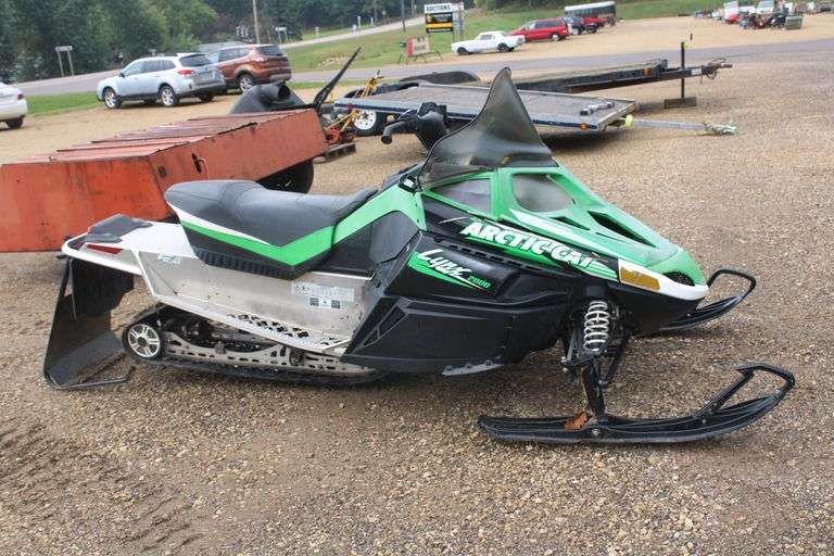 2014 Arctic Cat snowmobile w/cover & stand