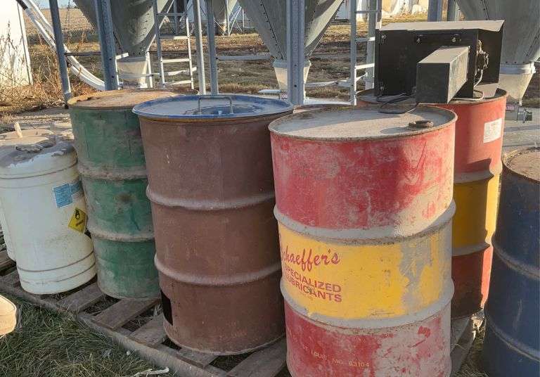 Assorted metal barrels, plastic barrels