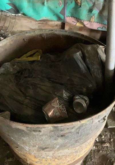 Barrel containing aluminum cans
