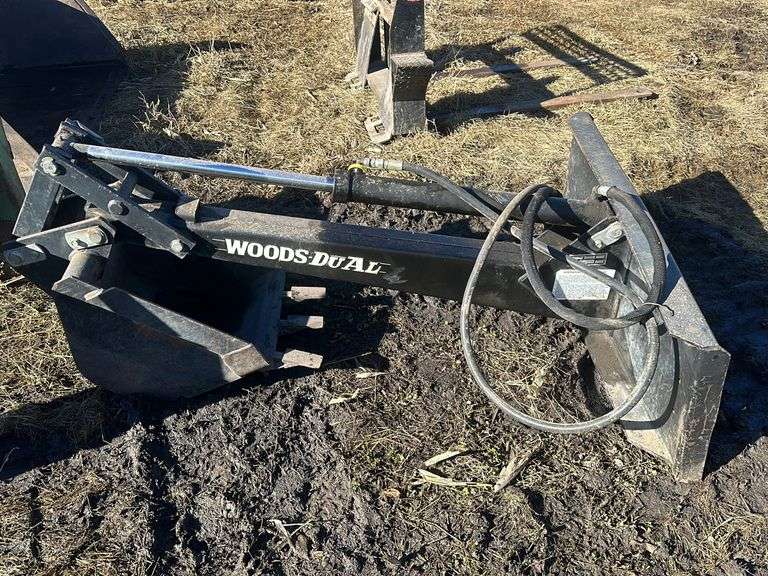 Woods Dual 720 backhoe attachment  18” bucket, universal skid loader plate