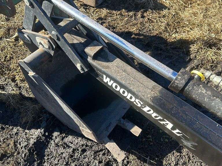 Woods Dual 720 backhoe attachment  18” bucket, universal skid loader plate