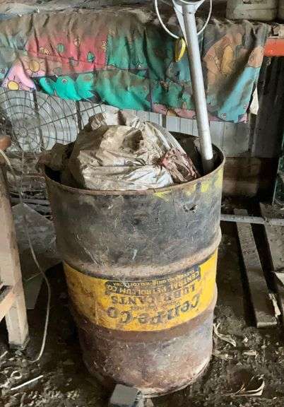 Barrel containing aluminum cans
