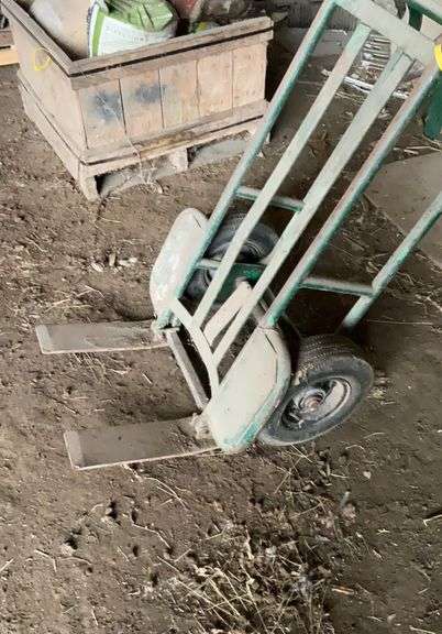 Two wheeled feed bag dolly