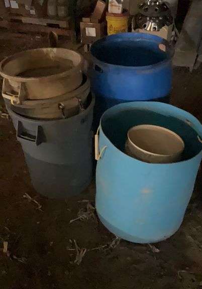 Rubbermaid garbage cans, plastic barrel garbage cans-one contains fertilizer