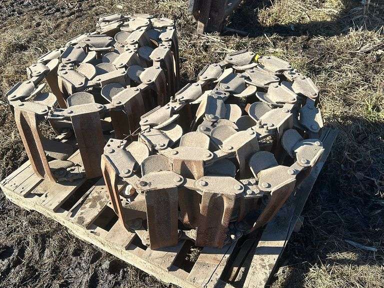 Steel skid loader track
