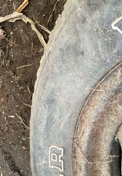 (2) four bolt rims with tires