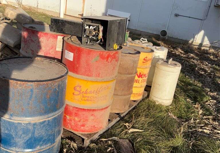 Assorted metal barrels, plastic barrels