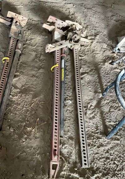 (2) hi lift jacks-one missing a handle