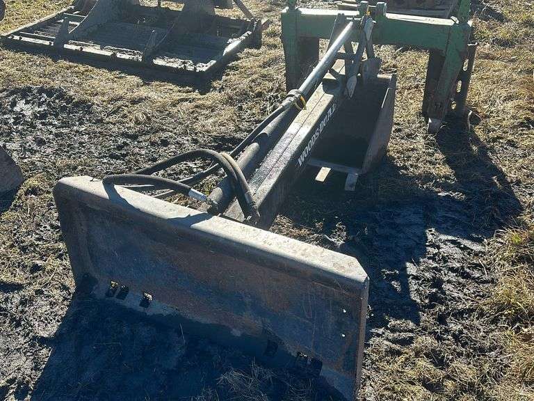 Woods Dual 720 backhoe attachment  18” bucket, universal skid loader plate