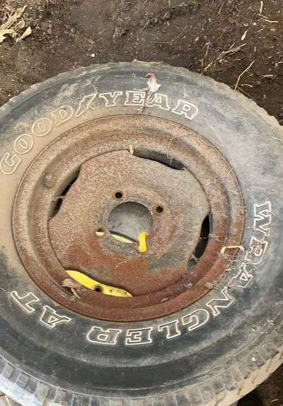(2) four bolt rims with tires
