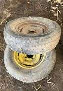 (2) four bolt rims with tires