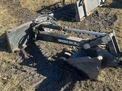 Woods Dual 720 backhoe attachment  18” bucket, universal skid loader plate