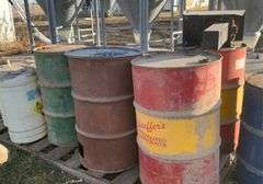 Assorted metal barrels, plastic barrels