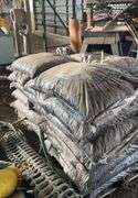 Pallet containing bagged, black mulch