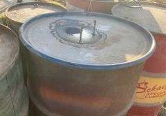 Assorted metal barrels, plastic barrels