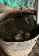 Barrel containing aluminum cans