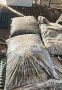 Pallet containing bagged, black mulch