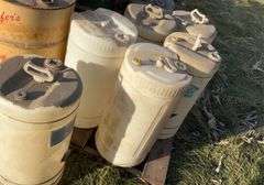 Assorted metal barrels, plastic barrels