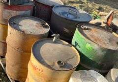 Assorted metal barrels, plastic barrels