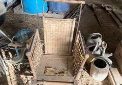 Antique steel, wheeled baby buggy