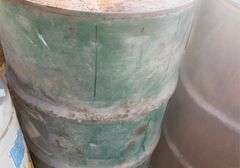 Assorted metal barrels, plastic barrels