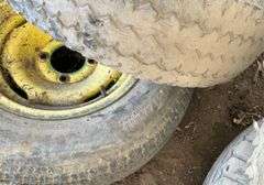 (2) four bolt rims with tires