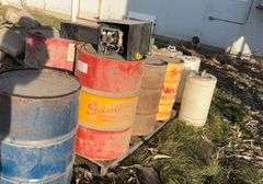 Assorted metal barrels, plastic barrels