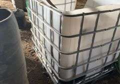 Cage tote containing wooden blocks