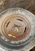 (2) four bolt rims with tires