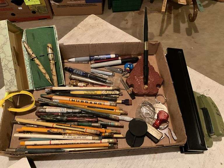 Large assortment of pencil and pens with advertisi