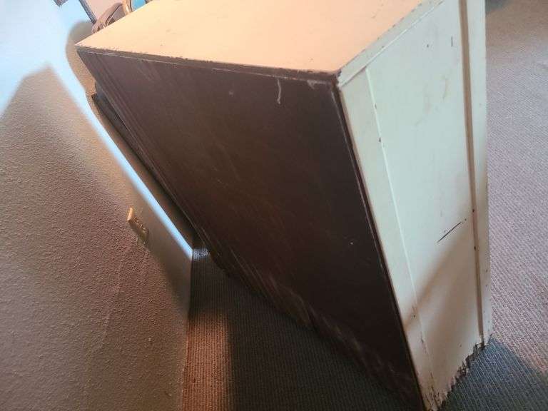 Vintage painted wooden bookshelf.