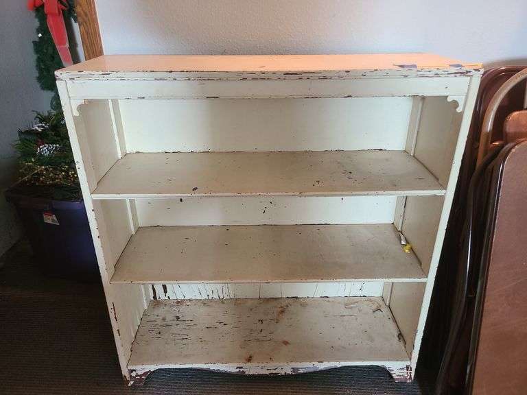 Vintage painted wooden bookshelf.