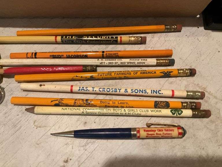 Large assortment of pencil and pens with advertisi