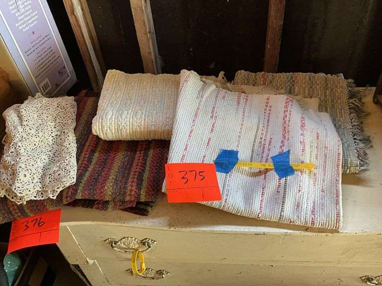 Assortment of rugs, crocheted dresser scarf