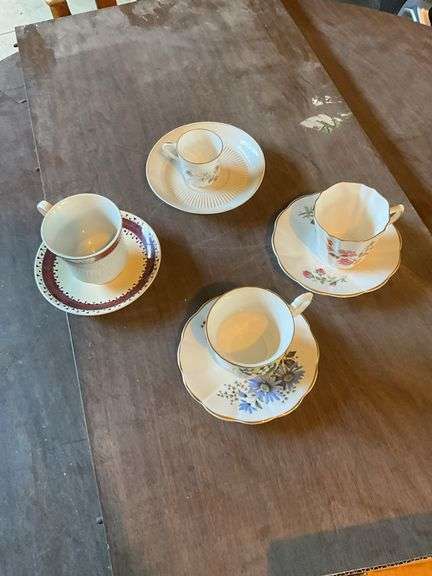(4) Porcelain Cups Saucers