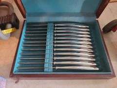 Saladmaster knife set in case.