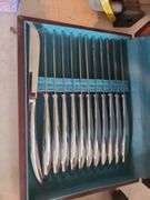 Saladmaster knife set in case.
