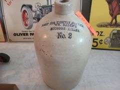 Vintage dome top jug with writing