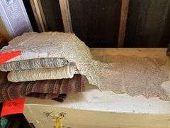Assortment of rugs, crocheted dresser scarf