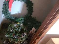 Contents of closet - Christmas wreaths, Christmas 