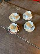 (4) Porcelain Cups Saucers