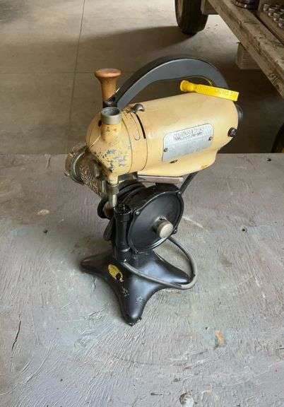 Vintage Hamilton Beach Model D hand mixer on meat grinder