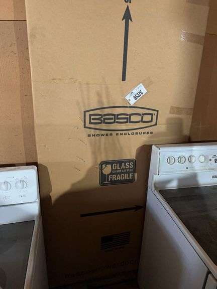 Basco shower enclosure in original packing– Located in garage