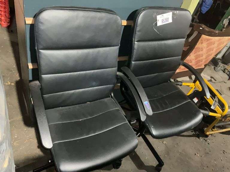 (2) Rolling office chairs – located garage