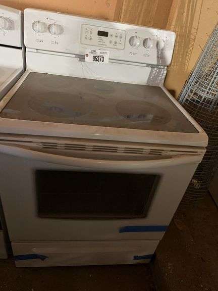 Used electric Crosley glass top range/oven – located garage
