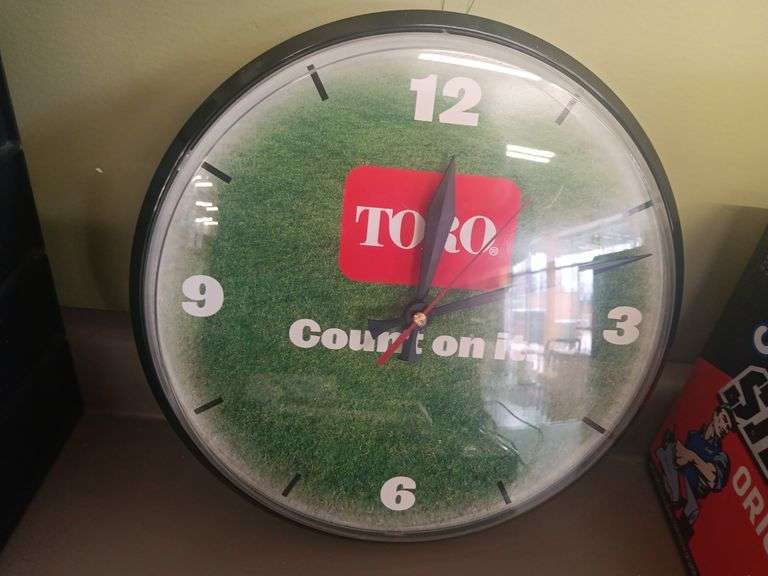 Toro Clock, Located Behind Front Desk - Hamilton-Maring Auction Group