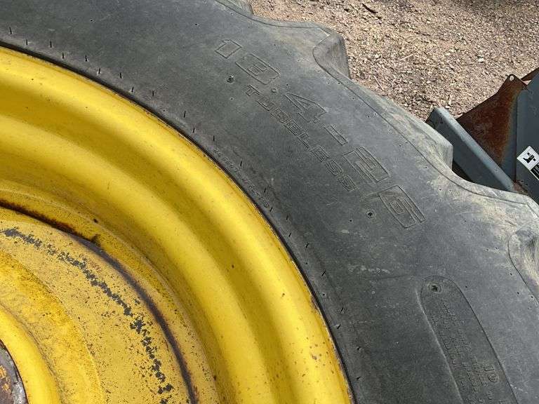 (2) John Deere 18.4 x 26 Tires on 8 Bolt Rims